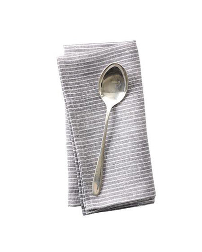 Light gray linen napkin with thin white stripes